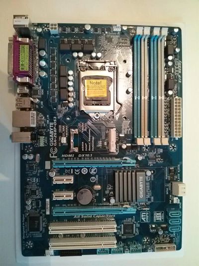 Лот: 3007543. Фото: 1. материнская плата с сокетом LGA1155... Материнские платы