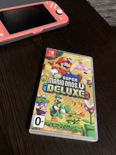 Лот: 19346578. Фото: 1. New Super Mario Bros. U Deluxe. Игры для консолей