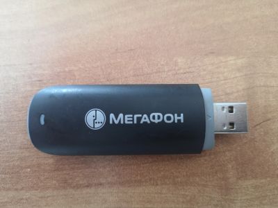 Лот: 16409792. Фото: 1. USB модем от Мегафон E173, 3G. Беспроводные модемы