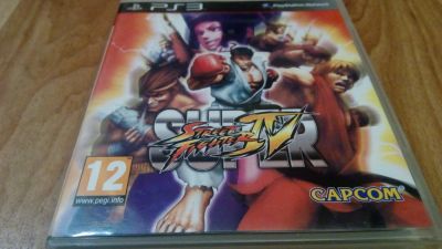 Лот: 9891284. Фото: 1. Super Street Fighter IV PS3... Игры для консолей