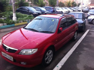 Лот: 7671454. Фото: 1. бампер передний mazda familia... Кузов