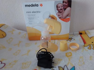 Лот: 16336774. Фото: 1. Молокоотсос Medela Mini Electric... Всё для кормления