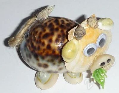 Лот: 537013. Фото: 1. Бычёк из ципреи тигрис. Ракушки... Другое (сувениры, подарки)