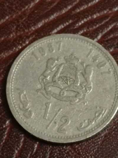 Лот: 20044641. Фото: 1. 1/2 дирхама 1987 г. Марокко. Нечастая... Африка