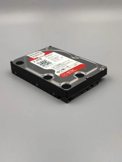 Лот: 19232945. Фото: 1. WD Red 3.5 HDD SATA 2TB WCC4M7TH4A2H. Жёсткие диски (HDD)