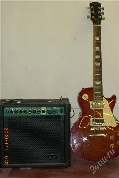 Лот: 2070593. Фото: 1. Stagg 20 GA R и Rockwill LP-60R... Гитары