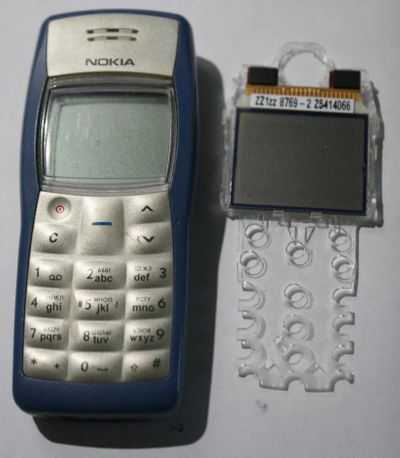 Лот: 7932175. Фото: 1. Nokia 1100 без крышки + дополнительный... Кнопочные мобильные телефоны