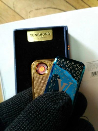 Лот: 9078195. Фото: 1. Зажигалка-брелок. Другое (сувениры, подарки)