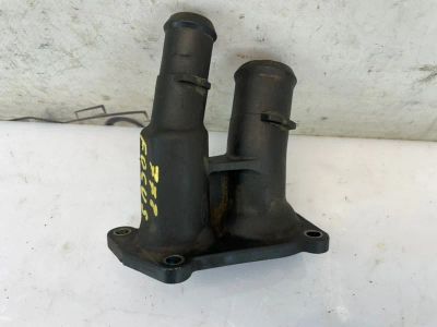 Лот: 24965116. Фото: 1. корпус термостата Ford Focus CB4. Двигатель и элементы двигателя