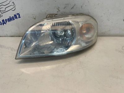 Лот: 23532257. Фото: 1. фара Chevrolet Aveo T250. Двигатель и элементы двигателя