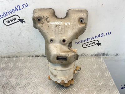Лот: 25436766. Фото: 1. коллектор выпускной Nissan Almera... Двигатель и элементы двигателя