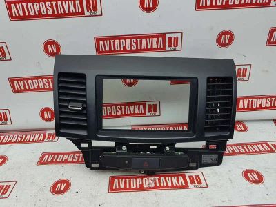 Лот: 20900719. Фото: 1. Рамка магнитолы Mitsubishi Galant... Двигатель и элементы двигателя
