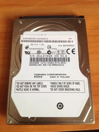 Лот: 3043193. Фото: 1. Винчестер Toshiba 2,5" 7mm 320GB... Жёсткие диски (HDD)