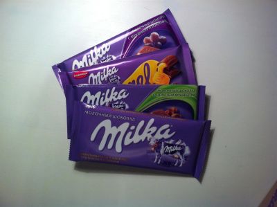Лот: 3330775. Фото: 1. Шоколадки Milka ассорти,(4шт). Шоколад, конфеты