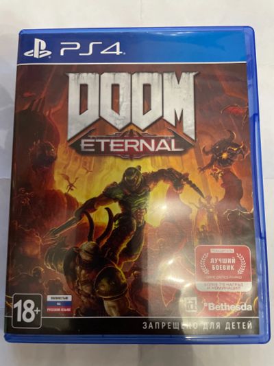 Лот: 18423389. Фото: 1. Диск PS4 DOOM Eternal. Игры для консолей