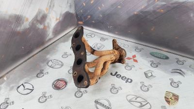 Лот: 23588255. Фото: 1. Коллектор выпускной Honda Fit... Двигатель и элементы двигателя