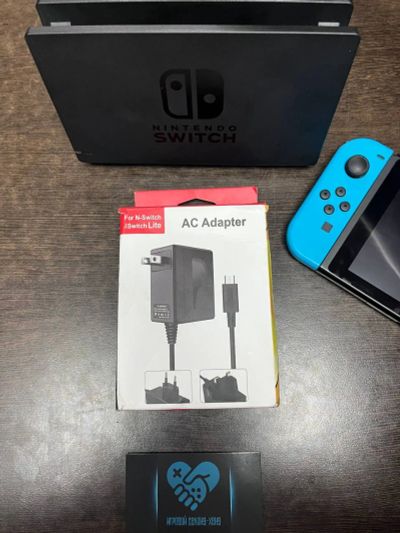 Лот: 16435773. Фото: 1. Зарядное устройство для Nintendo... Аксессуары для игровых приставок, консолей, геймпады