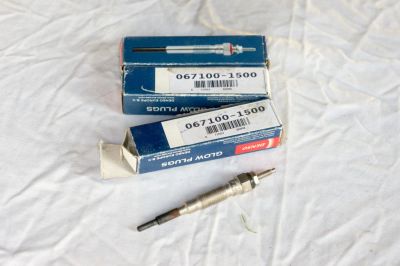 Лот: 10583595. Фото: 1. Свеча накала Denso 067100-1710... Двигатель и элементы двигателя