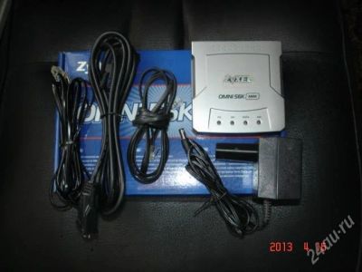 Лот: 2714502. Фото: 1. Модем ZyXEL OMNI 56K MINI. Проводные модемы