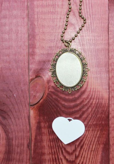 Лот: 9017259. Фото: 1. металический брелок в форме сердце... Другое (сувениры, подарки)