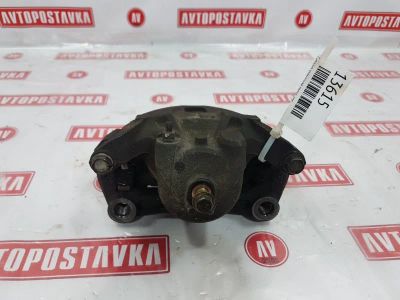 Лот: 20903658. Фото: 1. Суппорт тормозной Nissan Lafesta... Тормозная система
