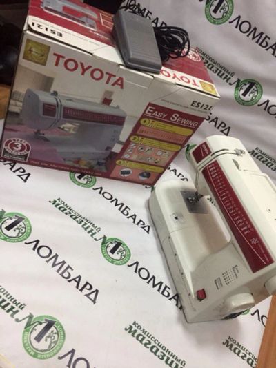 Лот: 10693120. Фото: 1. Швейная машинка Toyota ES 121. Швейная, вязальная