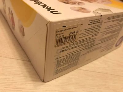 Лот: 10696015. Фото: 1. Молокоотсос ручной Medela с соской... Всё для кормления