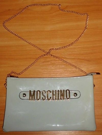 Лот: 10025295. Фото: 1. Клатч серый сумка Moschino кожзам... Сумки