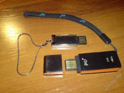 Лот: 345196. Фото: 1. Две убитые флешки 2 и 4 Gb... Карты памяти