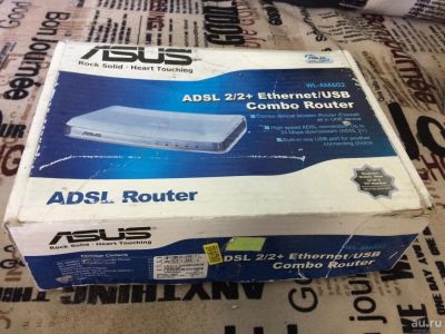 Лот: 9793316. Фото: 1. модем adsl Asus. Проводные модемы