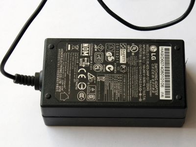 Лот: 15536878. Фото: 1. Блок питания LG 12V 2A. Зарядные устройства, блоки питания для бытовой техники