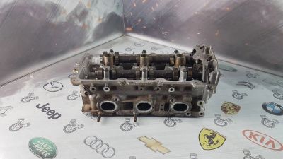 Лот: 23583155. Фото: 1. Головка блока цилиндров Nissan... Двигатель и элементы двигателя