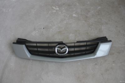 Лот: 17240762. Фото: 1. Решетка радиатора Mazda Demio... Кузов
