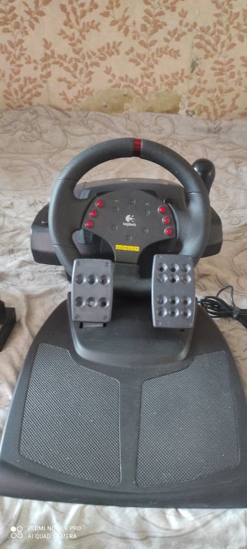 Лот: 21283807. Фото: 1. Игровой руль Logitech momo racing. Рули, джойстики
