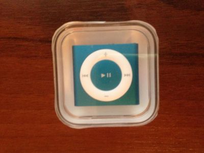 Лот: 3249940. Фото: 1. новый apple IPOD shuffle синий. Плееры