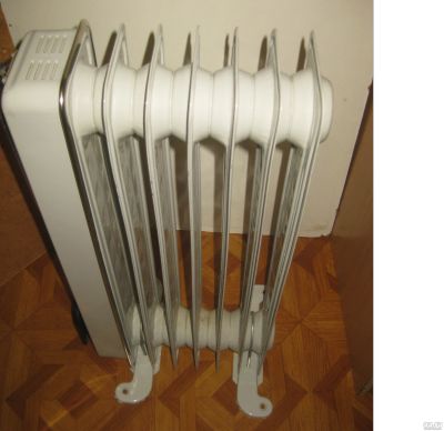 Лот: 18241779. Фото: 1. новый масляный обогреватель на... Обогреватели бытовые