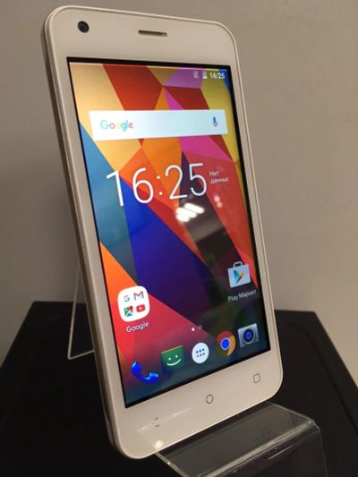 Лот: 17827783. Фото: 1. Смартфон Fly FS454 Nimbus 8. Смартфоны