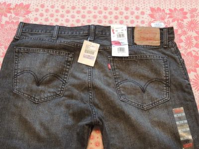 Лот: 11166998. Фото: 1. джинсы Levis черные, новые, модель... Брюки, джинсы, шорты