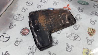 Лот: 23588060. Фото: 1. Поддон КПП Nissan Tiida HR15DE... Трансмиссия