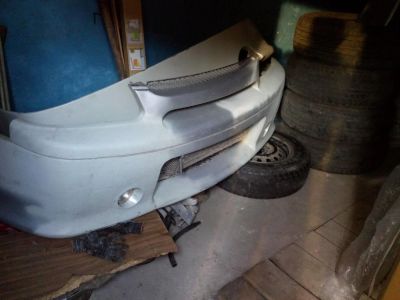 Лот: 4407635. Фото: 1. Nissan R`nessa бампер передний... Кузов