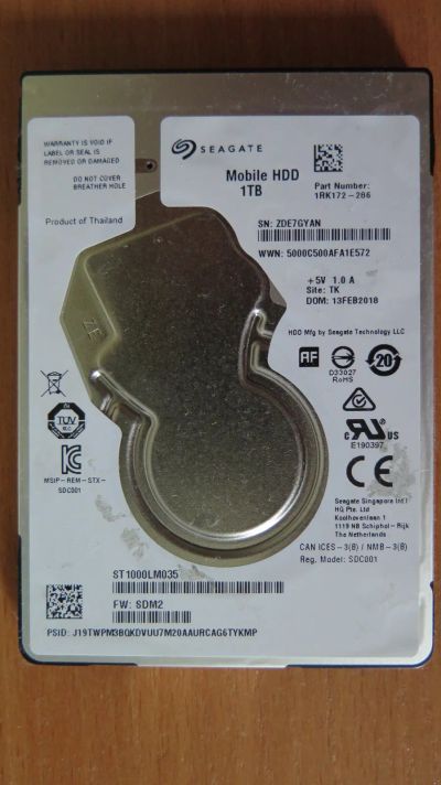 Лот: 25671864. Фото: 1. Жесткий диск Seagate ST1000LM035... Жёсткие диски (HDD)