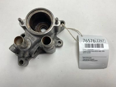 Лот: 21110407. Фото: 1. Корпус термостата Toyota Corolla... Двигатель и элементы двигателя