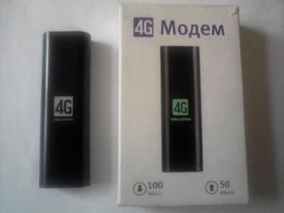 Лот: 3086841. Фото: 1. Модем Мегафон 4 G онлайн + красивый... Проводные модемы