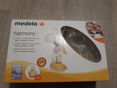 Лот: 19447606. Фото: 1. Молокоотсос medela с соской Calma. Всё для кормления