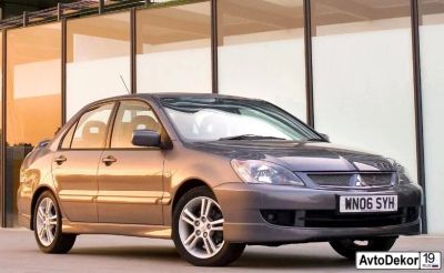 Лот: 13957657. Фото: 1. Накладки 2.0L на пороги Mitsubishi... Детали тюнинга