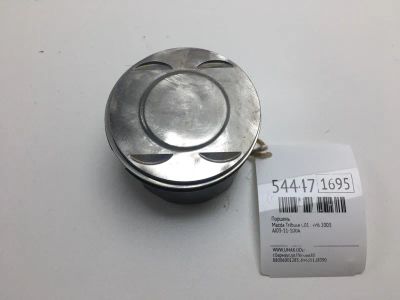 Лот: 20396890. Фото: 1. Поршень Mazda Tribute 2003 AJ0311100A... Двигатель и элементы двигателя