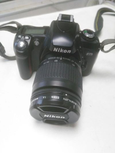 Лот: 9258512. Фото: 1. Nikon f75 + nikkor 28-80, marumi58mm. Плёночные зеркальные