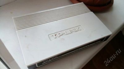 Лот: 5672626. Фото: 1. Маршрутизатор TP-LINK TL-R460. Маршрутизаторы (роутеры)