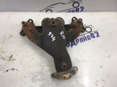Лот: 21716384. Фото: 1. коллектор выпускной Kia Rio DC. Двигатель и элементы двигателя