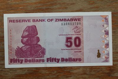 Лот: 22170646. Фото: 1. Зимбабве 50 долларов 2009 года... Африка
